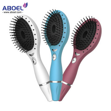 China Battery Electric Ionic Massage Hair Brush Hair Comb Head