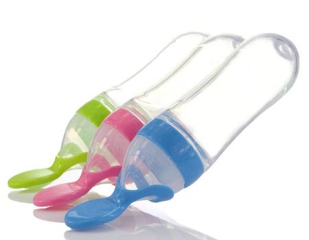 baby feeding bottles with spoon