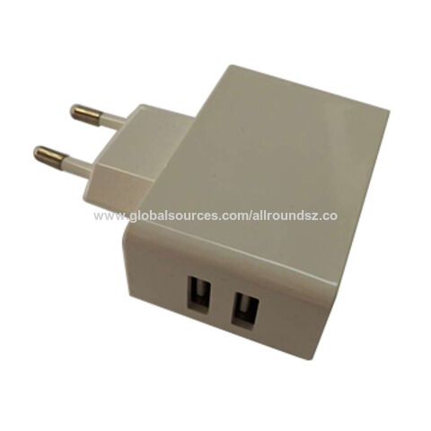 Compre Enchufe Europeo Dual Usb 10w A/c Adaptador A/c Cargador Para El  Hogar y Cargador de China por 1.43 USD