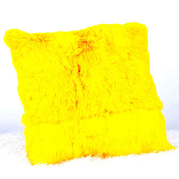 yellow fuzzy pillow