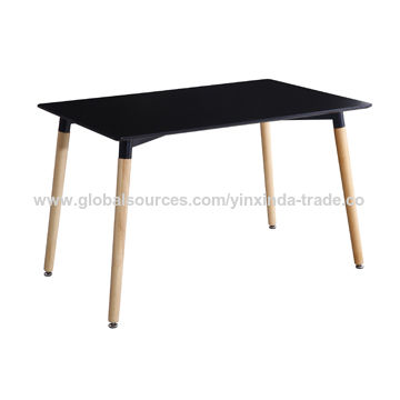 black table with wooden legs