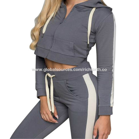 Conjunto deportivo urbano de moda con puños acanalados, sudadera con cremallera y capucha corta para mujer, ideal para yoga.