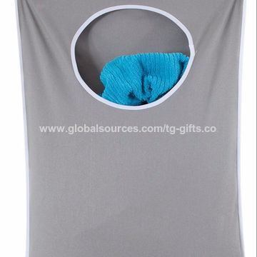 Laundry bag outlet door hanger