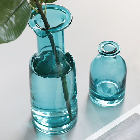 Wunderschöne, unterschiedlich große, hohe blaue Glasvase mit großem Blumendesign