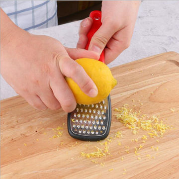 Stainless Steel Hand-Held Zester for Kitchen Cheese Grater - China
