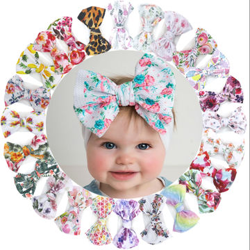 Babies  girls white headband with 4 colourful  flowers 