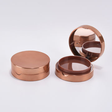 empty compact powder container