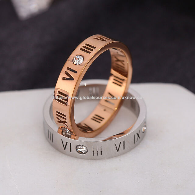 Anillo de pareja sencillo y hueco con números romanos, acero de titanio, oro rosa de 18 quilates y diamantes, estilo temperamental for sale at factory direct price