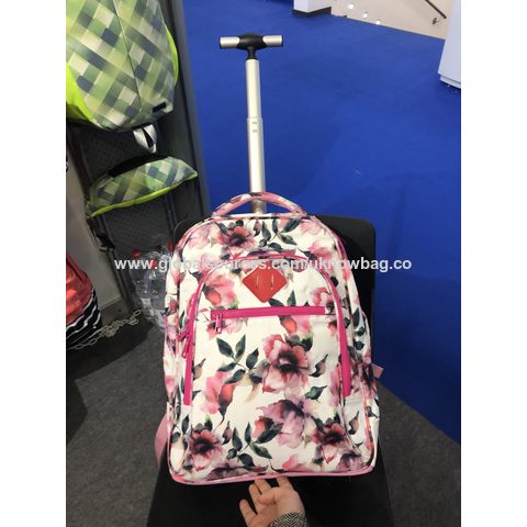 backpack rolling girl