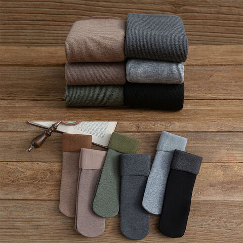 Calcetines de nieve térmicos de tubo largo de invierno y calcetines de nieve de moda de terciopelo grueso para hombres y mujeres