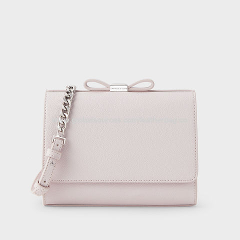 leather purse with bow