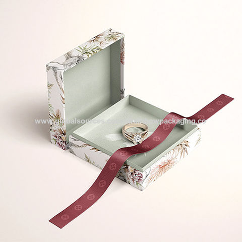 Chanel box packaging - fancy flower and ribbon.