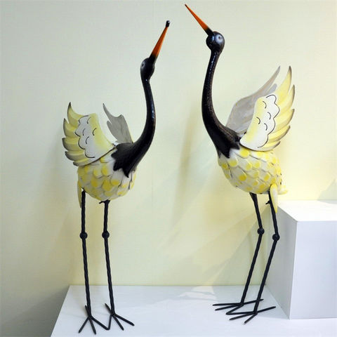 outdoor stork statue