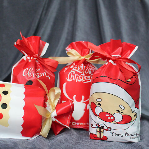 Bolsas de regalo de plástico navideñas, bolsa de dulces, bolsa con cordón de dibujos animados, bolsa de calcetín for sale at factory direct price
