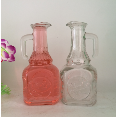 https://p.globalsources.com/IMAGES/PDT/B1195654616/oil-glass-handle-bottle-with-spout.png