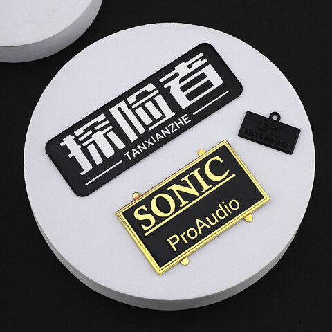 Wholesale China Custom Metal Raised Letters Clothing Label Plated