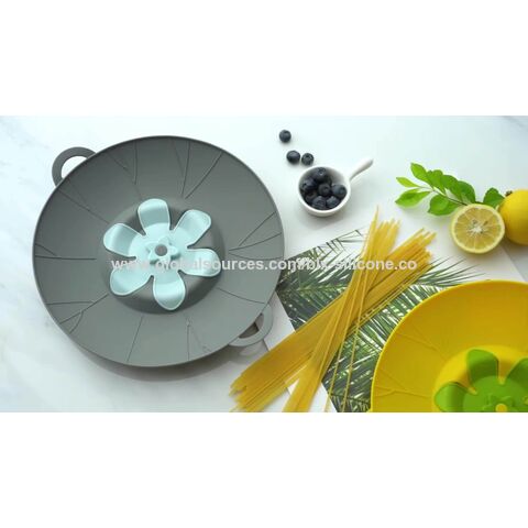 Wholesale Silicone Pot Cover Spill Stopper Lid - China Kitchen Racks and  Cookware Parts price