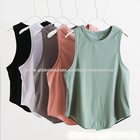 Factory Direct High Quality China Wholesale Tank Top Women Fast Dry Muscle Fit  Tank Top Women Curved Hem Gym Athletic Tank Top Women $9.1 from BEIJING  DEVELOPMENT IMP&EXP.CORP.LTD