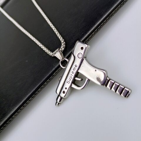 Supreme gun hot sale necklace price