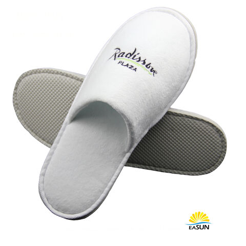 Bulk hot sale hotel slippers