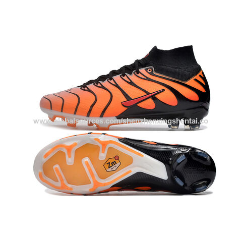 Orange and black nike football boots best sale