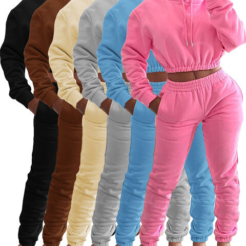 WOO Venta al por mayor Último diseño Conjunto de chándal para mujer de dos piezas, top de manga larga y pantalones deportivos holgados lisos