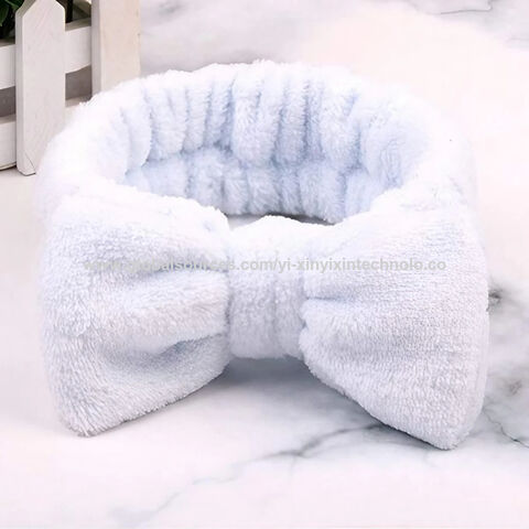 عصابة رأس من صوف مرجاني أبيض مخصصة من الفلانيل لغسل الوجه والمكياج مع فيونكة للنساء for sale at factory direct price