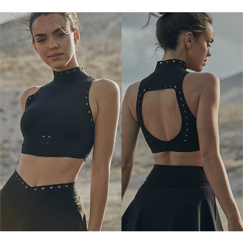 Conjunto de 2 piezas para mujer: Vestido deportivo de tenis y yoga con corte láser en la cintura, diseño hueco y falda de tenis con tops de tirantes for sale at factory direct price