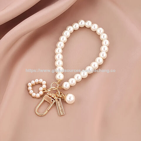 Llavero con colgante de pulsera de amor creativo 2025, accesorios de perlas al por mayor