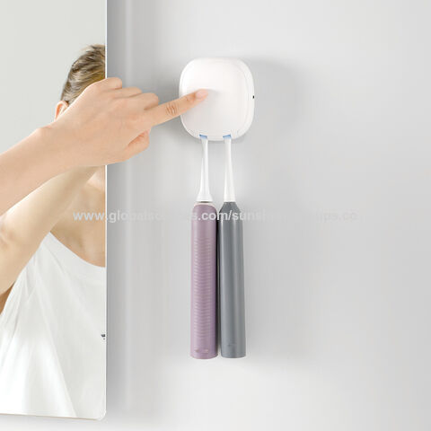 Stérilisateur de brosse à dents à montage mural sans perforation UVC à stérilisation ultraviolette et boîte de séchage pour brosse à dents, support de rangement for sale at factory direct price