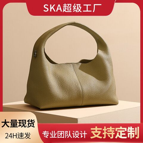 Bolsa feminina de couro de vaca de primeira camada, design simples de alta qualidade, bolsa dumpling de interesse especial, bolsa de viagem de grande capacidade, bolsas portáteis da moda for sale at factory direct price