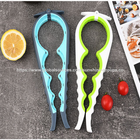 Abridor de garrafas quatro em um para uso doméstico, abridor de latas, chave de fenda, cola macia de PVC, abridor multifuncional for sale at factory direct price