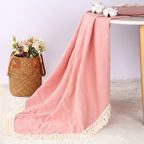 Couverture pour enfants en gros, double épaisseur, pliante, couverture d'emmaillotage en pur coton doux avec pompons, couverture de poussette pour bébé, pour la maison