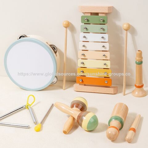 Instrumentos de percussão Orff de madeira, agitadores vocais infantis, chocalhos, tambores de mão, sinos, xilofones, brinquedos
