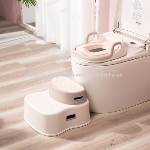 Set combinado de asiento de inodoro y taburete para pies, diseñado para fomentar la autonomía de los bebés en el aprendizaje del uso del baño