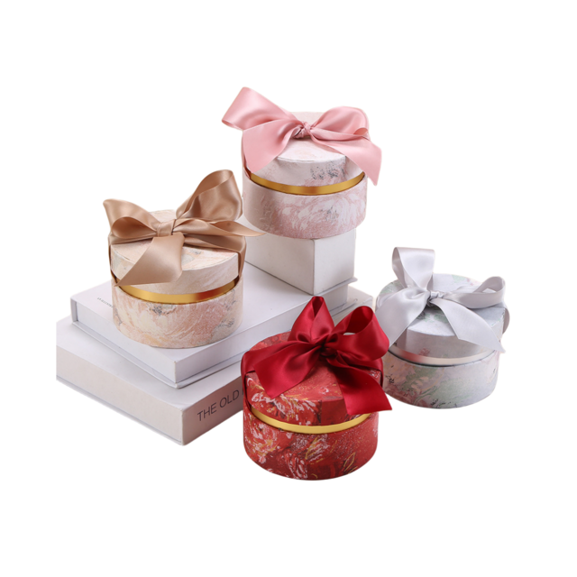 Zylindrische Geschenkverpackungen aus luxuriösem, bedrucktem Karton mit individuellem Band von ACME Packaging