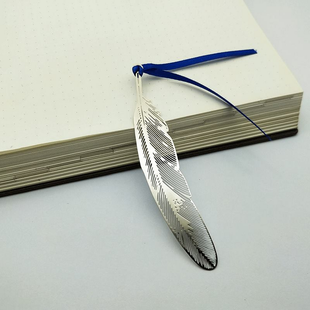 Marcapáginas de metal con nuevo diseño redondo y elegante, grabado láser y calado artesanal