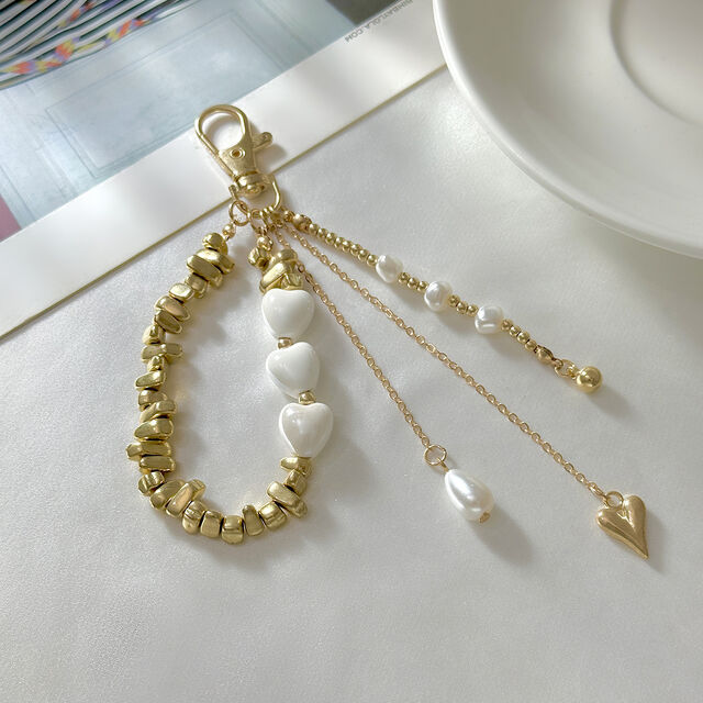 Al por mayor Nuevo Colgante Llavero de Moda Versátil en Forma de Corazón y Pájaro con Perla Artificial, Cristal y Piedra CCB para Decoración de Bolsos y Llaves