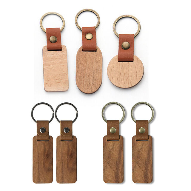 Venta al por mayor de colgantes de madera grabados creativos, regalo de llavero de madera en blanco grabado con láser for sale at factory direct price