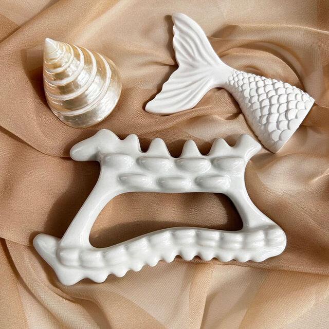 Manual massage tools Wenzhou Factory Facial Massager Hand Fish Bone Shaped Massage for Body Household Massager for sale at factory direct price