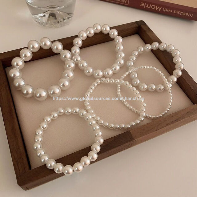 Pulseiras de pérolas de imitação estilo simples, pulseira de plástico com bom preço, aceitamos design personalizado