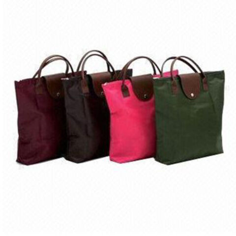 Sac de transport pliable avec logo personnalisé, différents designs disponibles, commandes OEM bienvenues