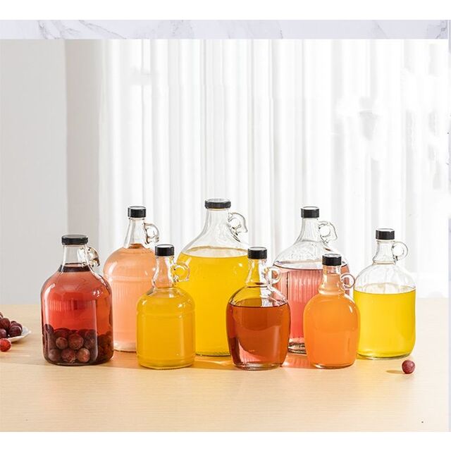 Vrac 16oz 32oz 64oz 128oz 192oz 1 Gallon Growler en Verre Transparent pour Jus, Cidres, Bières Artisanales, Carafe avec Bouchon Noir for sale at factory direct price