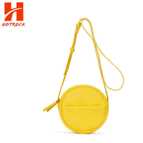 yellow round crossbody bag