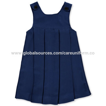Girl pinafore uniform Cut Out Stock Images & Pictures - Alamy