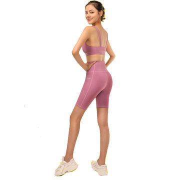 Knee-length tights shorts for women. Slim running leggings