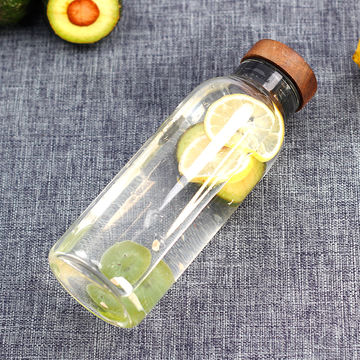 500ml Borosilicate sports glass water bottle with bamboo wood lid and  sleeve factory and manufacturers