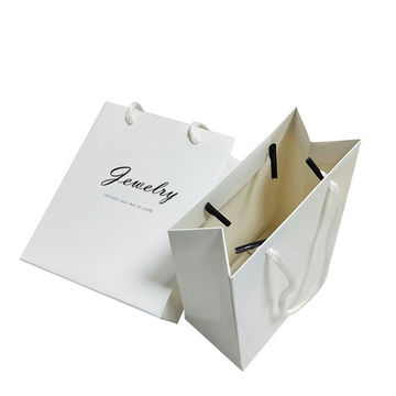Wholesales Promotion Sales Gift Paper Wine Bag with Hot Stamp Silver Foil  Ribbon Handle - China Paper Wine Bag and Hot Stamp Wine Bag price
