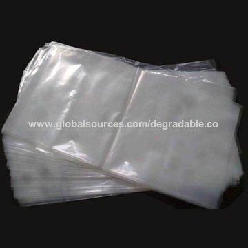 Wholesale wholesale punch hole bags handle ldpe die cut large plastic bags  with own logo From m.