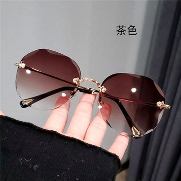 Women's Sunglasses Rimless Metal Frame - China Sunglasses and Sunglass  price
